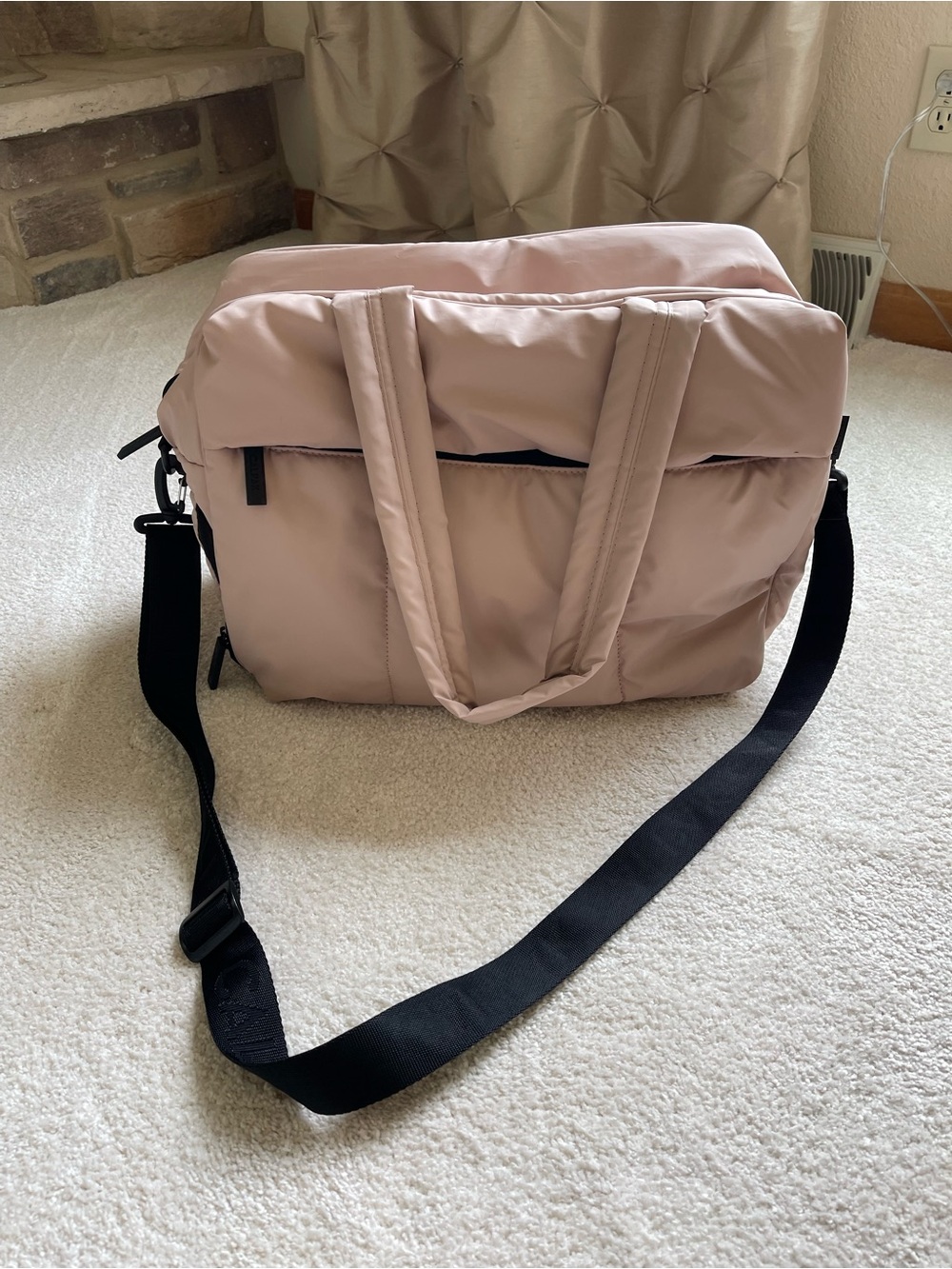 Calpak Luca duffle in Blush Pink Quilted fabric with Black Strap